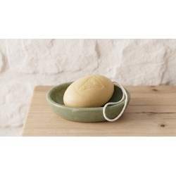 savon au lait d anesse dans une coupelle vert sauge